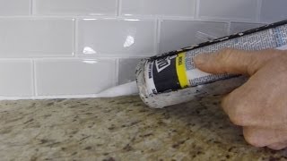 How To Install Caulk On A Kitchen Tile Backsplash [upl. by Fitzger807]