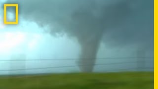 Tornadoes Lightning in Rare Video  National Geographic [upl. by Llovera]