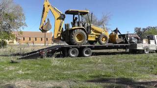 How To Load A Backhoe [upl. by Abih530]