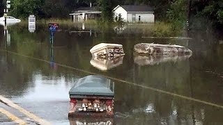 Eerie Coffins Seen Floating Through Flooded Louisiana Streets [upl. by Thagard]