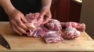 How to Break Down a BoneIn Pork Shoulder [upl. by Ennalorac]